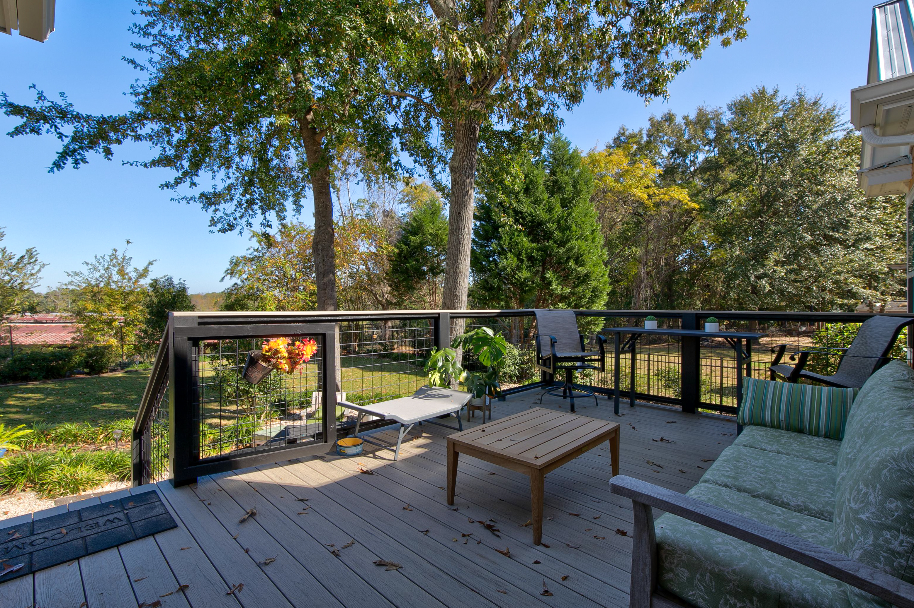 Back porch with patio furniture.