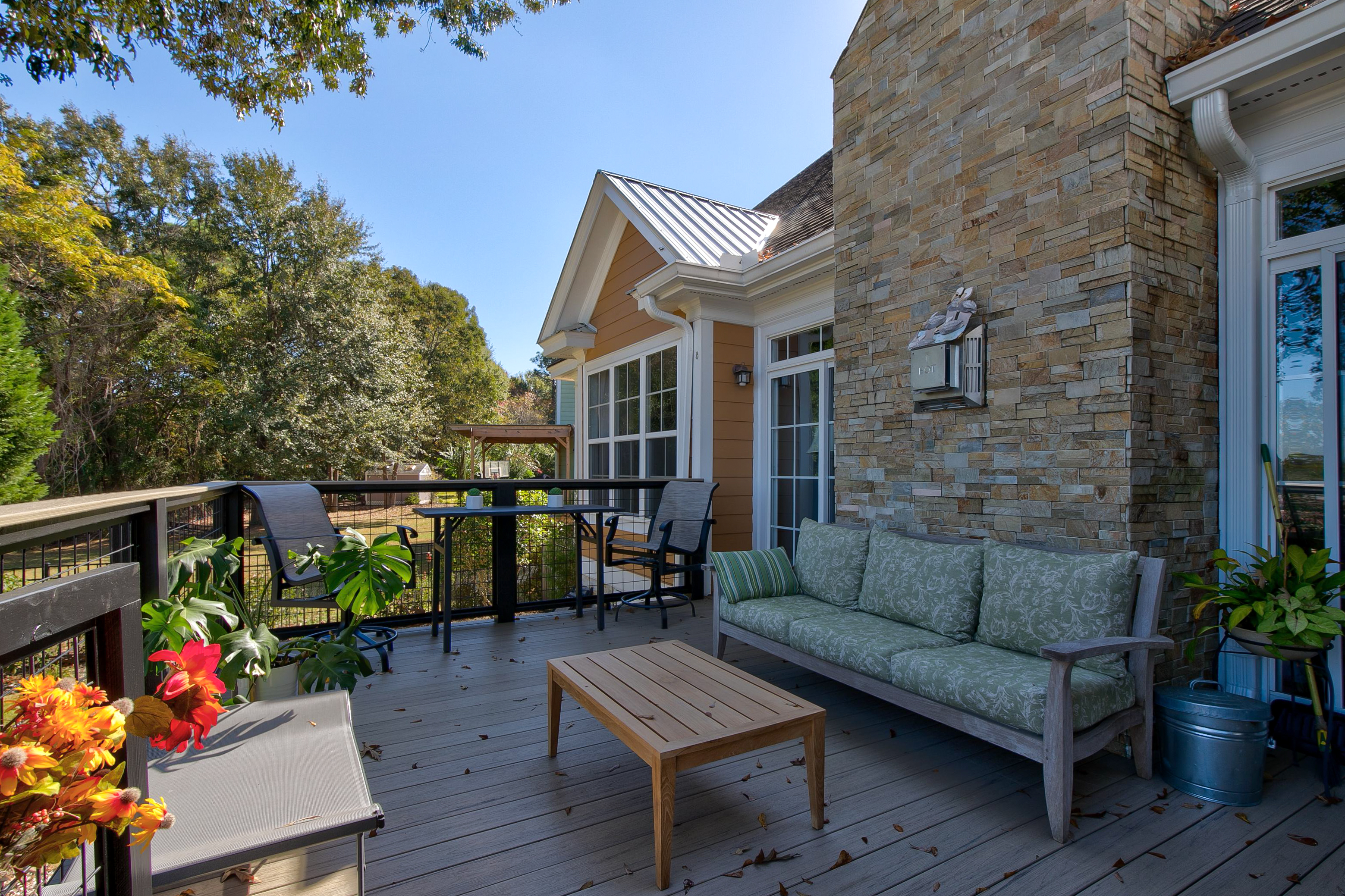 Back porch with patio furniture.