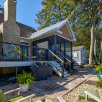 View of back porch with a screened in area from the back yard. 