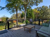 Back porch with patio furniture.