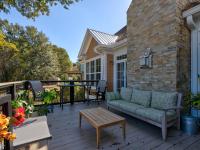 Back porch with patio furniture.
