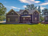 Exterior Front Rafter B Custom Lakeside Home