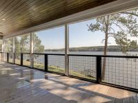 Lakeside view from rear screened porch on Rafter B Custom Home