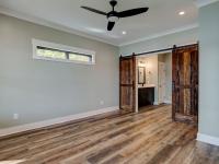 Interior room with wooden floors and rustic farmhouse sliding doors