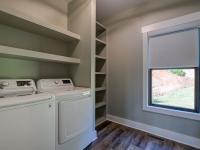Laundry room with built in shelving