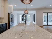 Close up of sink and marble countertops