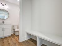 Built in bench outside of bathroom