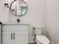 Bathroom with white cabinets