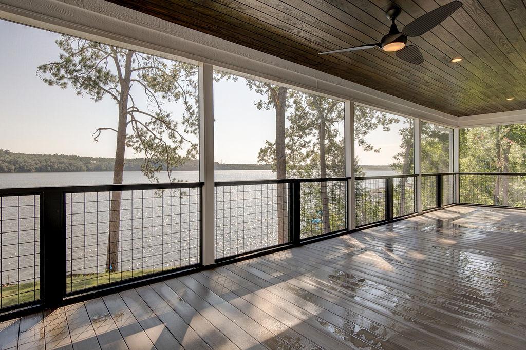 Lakeside view from rear screened porch on Rafter B Custom Home