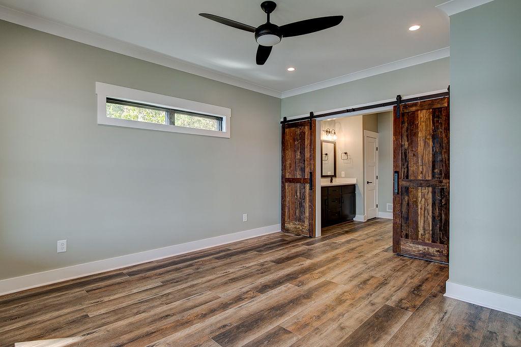 Interior room with wooden floors and rustic farmhouse sliding doors