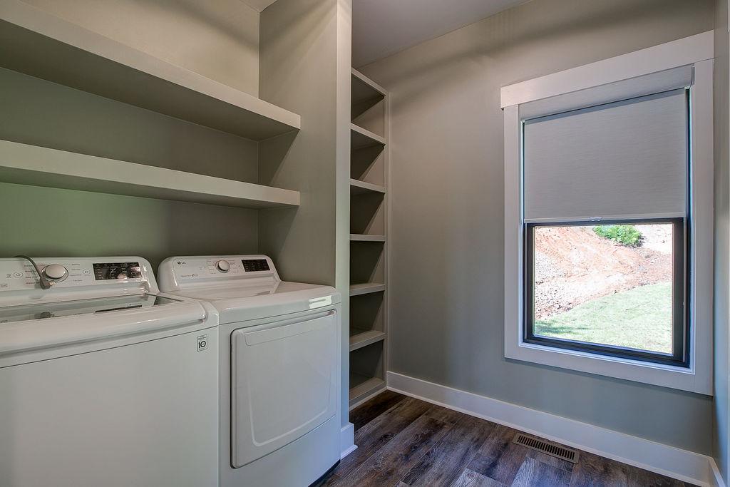 Laundry room with built in shelving