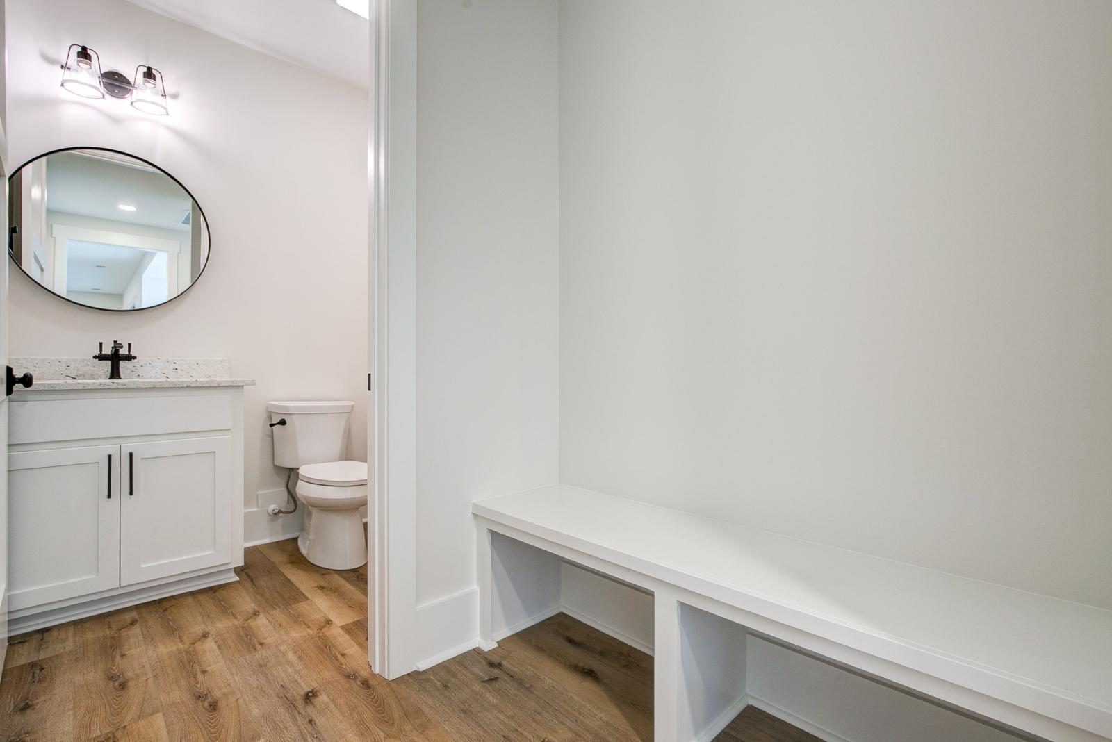 Built in bench outside of bathroom