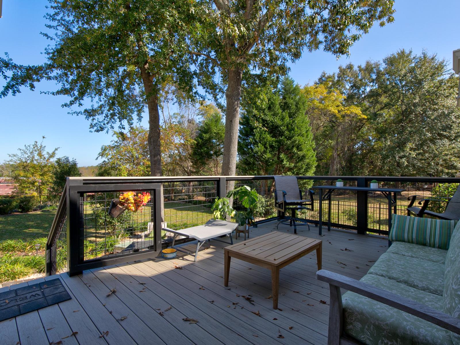 Back porch with patio furniture.